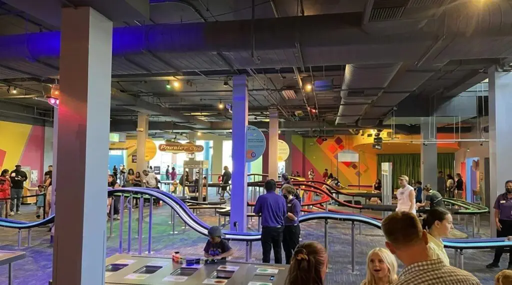 Discovery Cube, Orange County. Inside photo of families playing.