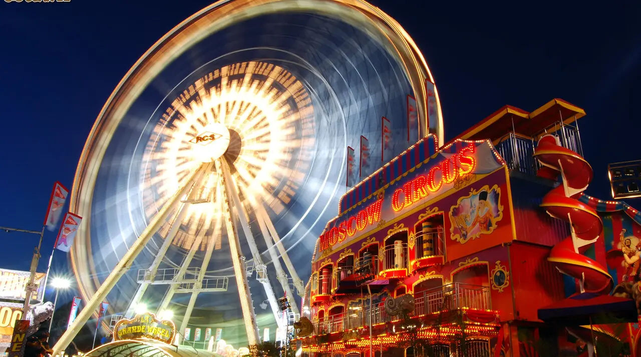 La Grande Wheel and Moscow Circus lights at the OC Fair in Costa Mesa at night