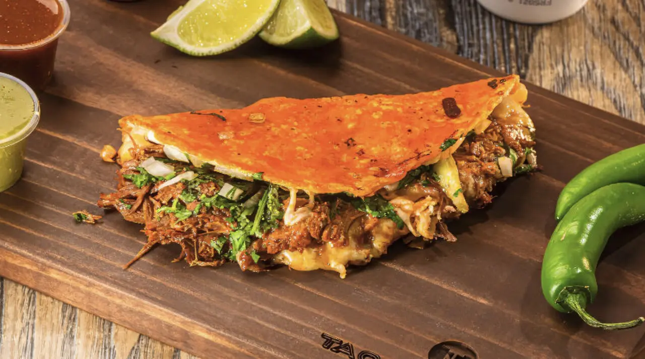 Handmade-tortilla birria and al pastor tacos at Tacos Madre Mexican Cocina on Harbor Boulevard in Costa Mesa