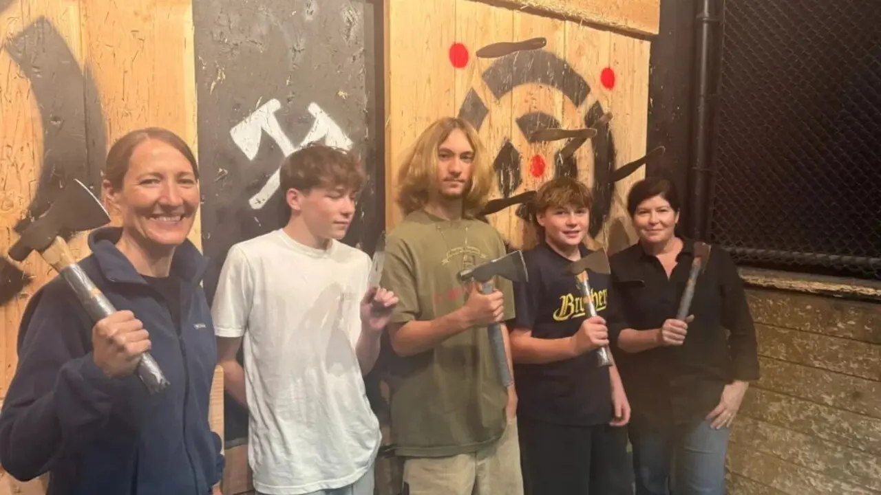 Indoor axe throwing lanes at King's Eye Escape in Westminster for a unique Orange County date night