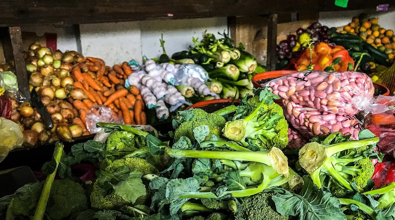 Fresh vegetables and fruit displays at SoCo Certified Farmers Market in Costa Mesa