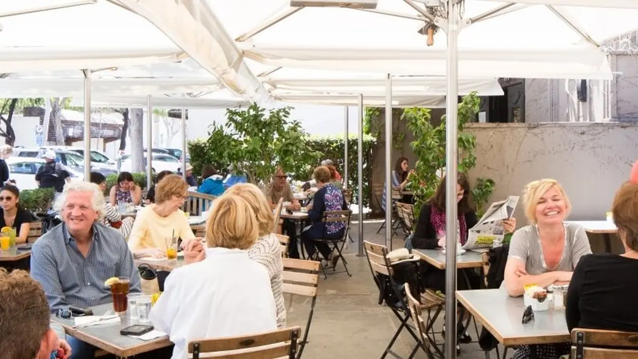 Garden cafe brunch setting at Zinc Cafe Laguna Beach on Ocean Avenue