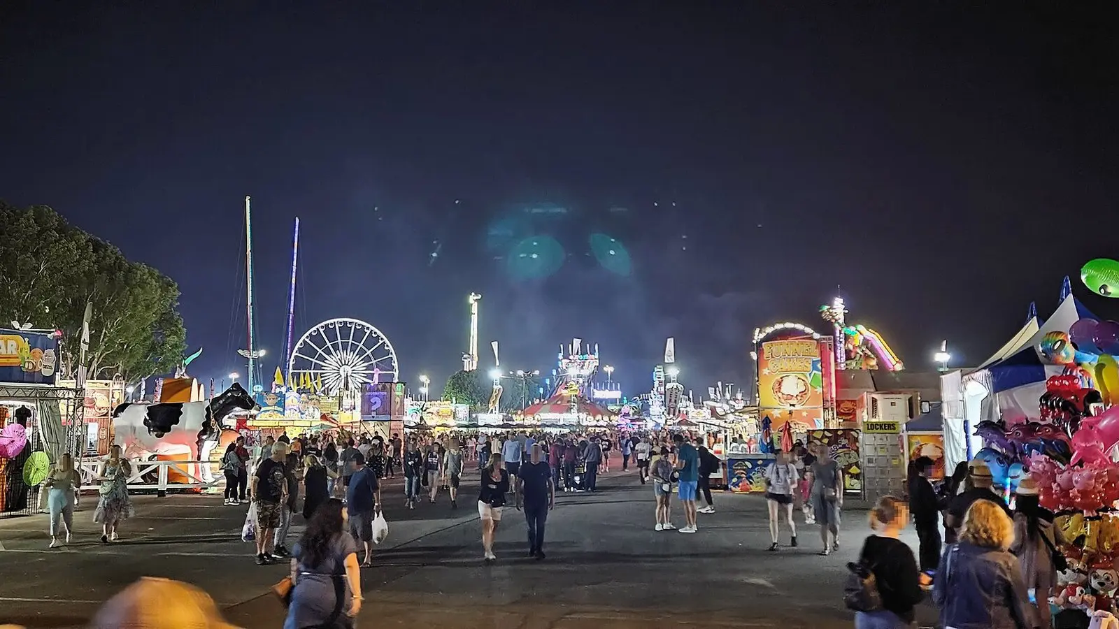 OC Fair and Event Center grounds in Costa Mesa at night during a fair weekend