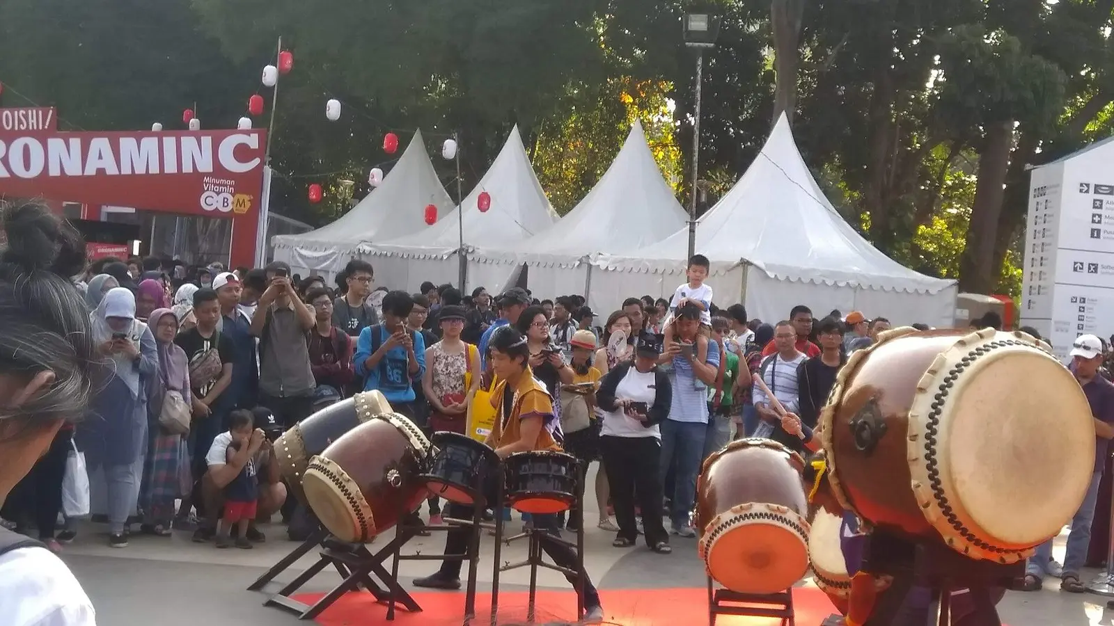 Taiko drum performers at a Japanese cultural festival type stage show